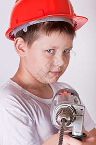 男孩子建设者螺丝刀承包商工具头盔钻头童年男生维修管理人员图片