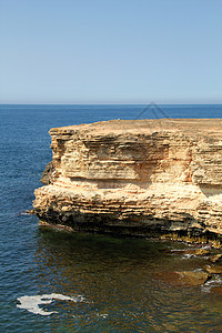 落岩悬崖 黑海海岸石灰石海洋地平线风景太阳海岸海湾悬崖岩石蓝色图片