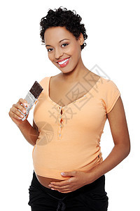 孕妇 吃巧克力的巧克力肚子女士妈妈生活家庭饮食母亲成人腹部食物图片