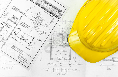 使用工人工具的建筑计划打印草图工程承包商绘画蓝图设计师头盔文档帽子图片