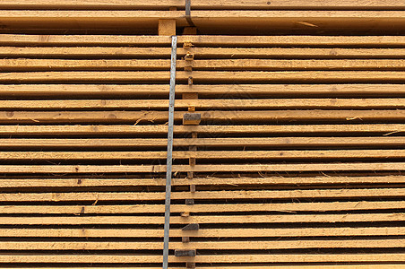 堆叠的木柴装饰材料建造黄色控制板木匠仓库木材贮存木工图片