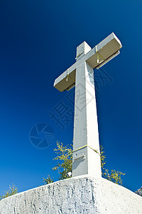 十字符号顶峰天堂高山阴影草地爬坡天空首脑太阳岩石图片