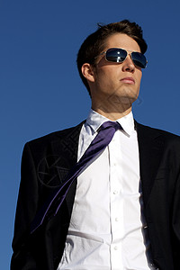 商务 商业和领带男性眼镜思维色调男人套装阳光天空人士图片