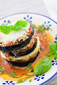 番茄加茄子馅饼食物外套豆类装饰平坦度宏观蔬菜肉汁烤箱图片
