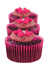 以粉红色装饰的可爱巧克力蛋糕冰镇面包师磨砂庆典面包派对小吃假期巧克力鞭打图片