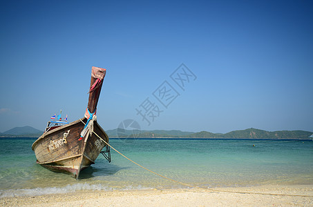 泰国长尾拖船热带海浪悬崖海景血管尾巴岩石珊瑚旅游娱乐图片