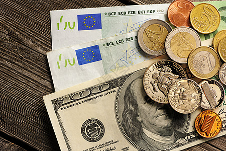 美元和欧元的木本金硬币木头现金商业储蓄银行业货币金融图片