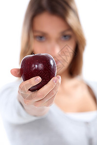 一位有苹果女人的肖像维生素饮食毒素头发水果工作室营养棕色食物女士图片