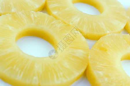成熟的菠萝切片水果叶子食物热带小吃饮食季节营养坚果甜点图片