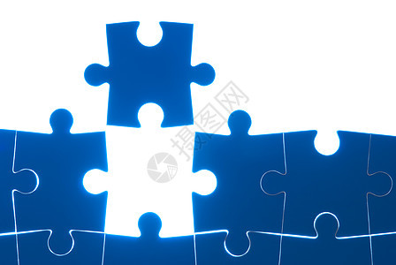 白色背景上孤立的蓝色拼图挑战商业概念团体解决方案闲暇成功空白战略玩具图片