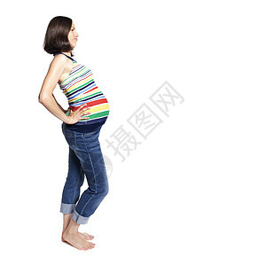 孕妇的肖像母亲新生活腹部身体幸福成人孩子牛仔裤准妈妈女性图片