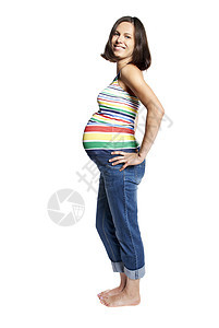 孕妇的肖像孩子成人女性牛仔裤母亲准妈妈婴儿白色女人微笑图片