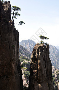 岩石山的景观旅游岩石力量悬崖自由高度黄色首脑石头远足图片