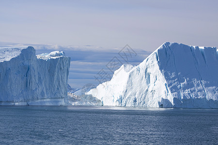 冰山冻结文章环境日出反射海洋天空岩石日落波浪图片