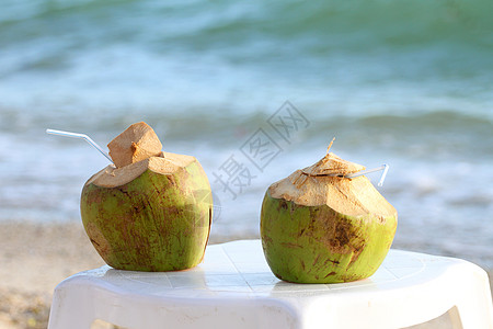 椰椰子鸡尾酒旅行蓝色旅游海岸海滩天堂椅子坚果晴天食物图片