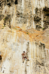 岩石征服期间的岩石攀岩石头高度首脑悬崖顶峰活动编队登山国家阳光图片