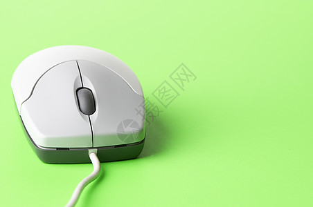计算机鼠标展示领带蛛网概念技术电子产品灰色互联网绿色聚光灯图片