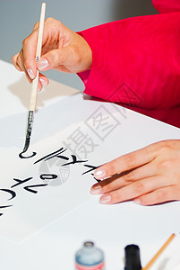 手在写字写作书法字母爱好艺术邮件工具工艺阅读女性高清图片