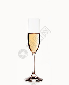 一杯香槟 在白色背景上被隔离庆典玻璃长笛派对金子饮料气泡液体起泡图片