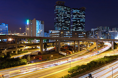 夜间与城市交接建筑速度戏剧性辉光市中心地球景观公共汽车线条交通图片