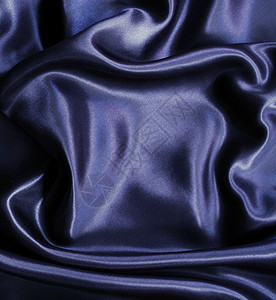 平滑优雅的黑色丝绸可用作背景灰色布料折痕织物生产材料版税纺织品寝具艺术图片