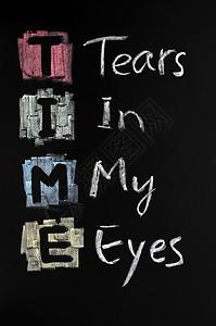 缩写缩略语 黑板上贴有粉笔黑色眼泪眼睛时间概念图片