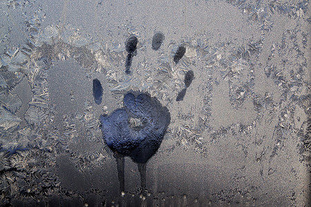 冰窗上的手印季节救援冻结手指低温窗户滴水棕榈阴影图片