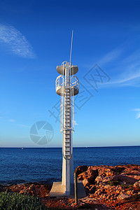 地中海Baywatch白色望望塔太阳气候蓝色日落海景天堂天空凉亭金子场景图片