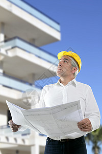 建筑设计师工程规划 寻找建筑图案建设者男性专家头盔城市承包商商业工作建筑师男人图片