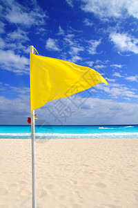 黄旗天气风警示旅行旗帜热带天空晴天支撑信号海景海浪阳光图片