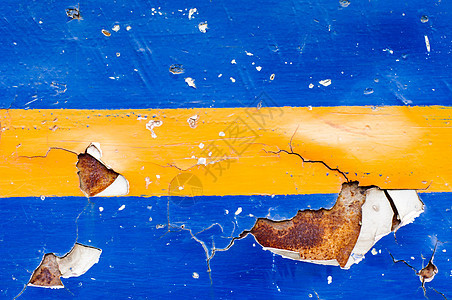 坚固的生锈金属板蓝色纹理盘子裂缝油漆金属背景图片