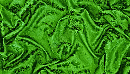 带波浪的抽象背景绿色丝织物图片