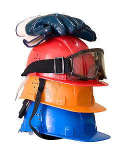 许多彩色硬帽 手套和护目镜染色工业安全工具塑料帽子反射风镜面具安全帽图片