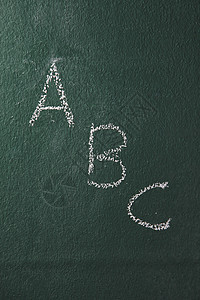 字母表粉笔教学学校黑板字体学习教育黑色意义木板背景图片