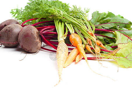 甜菜和胡萝卜健康橙子红色绿色树叶花园营养收成饮食蔬菜图片
