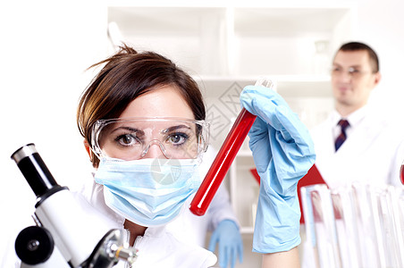 明亮外套在实验室中工作的化学家教育科学微生物学科学家职业技术外套医生管子生物学背景