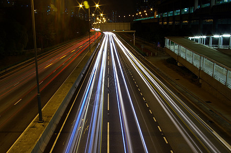 城市夜间交通地标戏剧性天空场景运输辉光市中心公共汽车驾驶运动图片