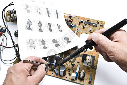 维修电路板焊接电容器处理器电脑技术技术员研究男人晶体管电气背景图片