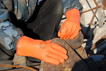 橙色手套乳胶工具身体建筑商业承包商男性建造修理工手指图片