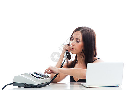 有旧电话和膝上型电脑的秘书女孩就业办公室呼唤微笑助手职业服务快乐老板工作图片