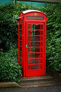 红色英语电话亭通讯商业固定电话自然光概念电话贸易电讯日光企业图片