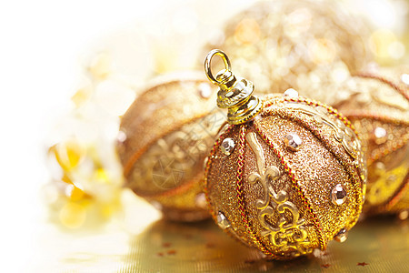 金色圣诞球金属季节欢乐假期庆典传统火花礼物展示喜悦图片