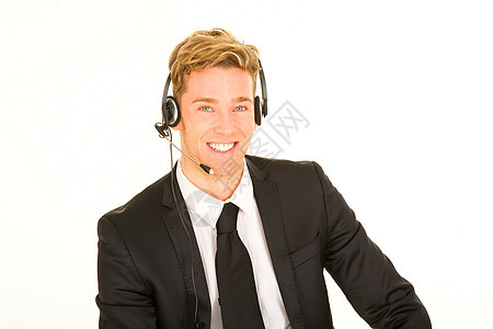 商务人士与耳机和麦克风客户服务 opearto领带职业男人微笑人士职业装商务商业工作夹克图片
