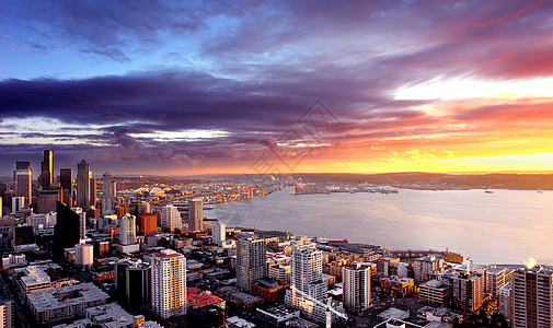 西雅图日落建筑物天空橙子摩天大楼风暴城市船运地平线旅游景观图片