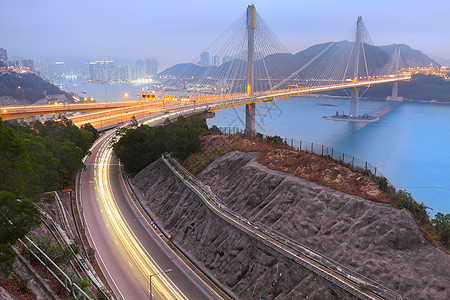 日落时丁九桥反射运动建筑速度商业交通运输蓝色场景天际图片