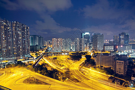 夜间在香港的交通戏剧性蓝色公共汽车地标街道景观场景建筑摩天大楼市中心图片