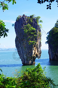 James债券岛石灰石阳光天空波纹异国小岛海岸蓝色海滩地质图片