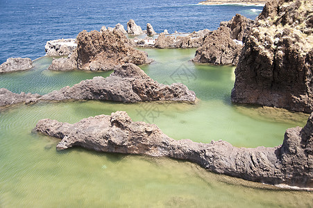 马 提拉小岛水池海洋泡沫蓝色火山游泳池波浪岩石旅游图片