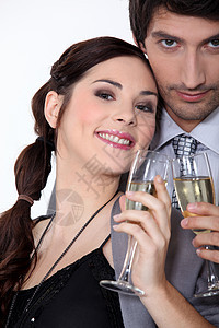 来喝杯欢乐饮料的情侣周年头发庆典马尾辫丈夫高脚杯派对生日眼睛女士图片