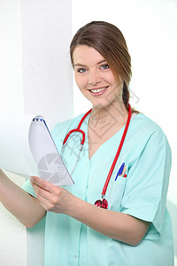护士看着日历的微笑工人女性眼睛实习生女士蓝色白色助手头发药品图片